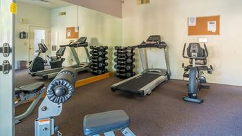 Estancia fitness center with weight stations and fitness equipment